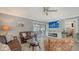Spacious living room with fireplace and sliding doors to patio at 205 Oak Hill Dr # 7, Sarasota, FL 34232