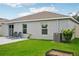 Backyard with patio and lawn at 208 Cascade Bend Dr, Ruskin, FL 33570