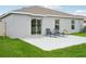 Backyard with patio and lawn at 208 Cascade Bend Dr, Ruskin, FL 33570