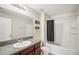 Clean bathroom with shower/tub and dark gray curtain at 208 Cascade Bend Dr, Ruskin, FL 33570
