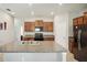 Modern kitchen with stainless steel appliances and granite countertops at 208 Cascade Bend Dr, Ruskin, FL 33570