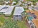 Aerial view showcasing house and surrounding landscape at 230 Vestavia Dr, Venice, FL 34292