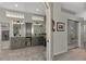 Elegant bathroom with double vanity and large walk-in shower at 230 Vestavia Dr, Venice, FL 34292