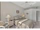 Cozy bedroom with wicker furniture and window seat at 230 Vestavia Dr, Venice, FL 34292