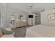 Primary bedroom with large window and walk-in closet at 230 Vestavia Dr, Venice, FL 34292