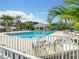 Inviting community pool with plenty of lounge chairs at 230 Vestavia Dr, Venice, FL 34292