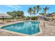 Inviting community pool with lounge chairs and patio area at 230 Vestavia Dr, Venice, FL 34292