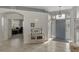 Spacious foyer with tiled floors and views into adjacent rooms at 230 Vestavia Dr, Venice, FL 34292