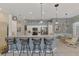 Modern kitchen with granite countertops and stainless steel appliances at 230 Vestavia Dr, Venice, FL 34292