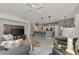 Open floor plan with kitchen, island, and living area at 230 Vestavia Dr, Venice, FL 34292