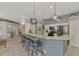 Modern kitchen with granite countertops and stainless steel appliances at 230 Vestavia Dr, Venice, FL 34292
