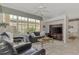 Spacious living room featuring comfortable seating and large windows at 230 Vestavia Dr, Venice, FL 34292