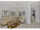 Spacious living room featuring a neutral color palette and ample natural light at 230 Vestavia Dr, Venice, FL 34292