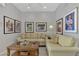 Cozy living room with a sofa and chairs, perfect for relaxing at 230 Vestavia Dr, Venice, FL 34292