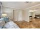 Light and airy bedroom with daybed and access to another room at 2325 Riverbluff Pkwy # V247, Sarasota, FL 34231