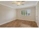 Spacious bedroom with hardwood floors and ceiling fan at 2325 Riverbluff Pkwy # V247, Sarasota, FL 34231