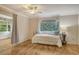 Bright bedroom with daybed and built-in shelving at 2325 Riverbluff Pkwy # V247, Sarasota, FL 34231