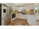 Updated kitchen with stainless steel appliances and granite countertops at 2325 Riverbluff Pkwy # V247, Sarasota, FL 34231