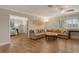 Open concept living room, bedroom and kitchen at 2325 Riverbluff Pkwy # V247, Sarasota, FL 34231