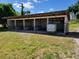 Open-air animal shelter featuring several stalls at 33931 Serene Dr, Punta Gorda, FL 33982