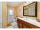 Bathroom with single vanity and exterior access at 33931 Serene Dr, Punta Gorda, FL 33982