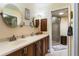 Double vanity bathroom with a walk-in shower at 33931 Serene Dr, Punta Gorda, FL 33982