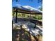 Park pavilion with picnic tables and grill at 33931 Serene Dr, Punta Gorda, FL 33982