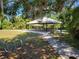 Park pavilion with picnic tables and a grill at 33931 Serene Dr, Punta Gorda, FL 33982