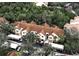 Aerial view of Bella Villino condos, showcasing building exteriors and lush landscaping at 4122 Central Sarasota Pkwy # 1914, Sarasota, FL 34238