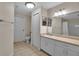 Bathroom boasts a toilet, sink, and linen closet at 4122 Central Sarasota Pkwy # 1914, Sarasota, FL 34238