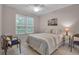 Cozy bedroom with a double bed and plenty of natural light at 4122 Central Sarasota Pkwy # 1914, Sarasota, FL 34238