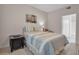 Spacious bedroom with a double bed and adjacent bathroom access at 4122 Central Sarasota Pkwy # 1914, Sarasota, FL 34238