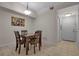 Dining area with four-chair table and lighting at 4122 Central Sarasota Pkwy # 1914, Sarasota, FL 34238