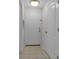 Clean entryway with tile flooring and neutral-toned walls at 4122 Central Sarasota Pkwy # 1914, Sarasota, FL 34238