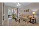 Bright living room with access to balcony at 4122 Central Sarasota Pkwy # 1914, Sarasota, FL 34238