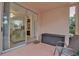 Private patio with sliding glass doors leading to the living area at 4122 Central Sarasota Pkwy # 1914, Sarasota, FL 34238