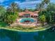 Resort-style pool and clubhouse with lake view at 4122 Central Sarasota Pkwy # 1914, Sarasota, FL 34238