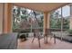 Relaxing screened patio with seating and lush greenery views at 4122 Central Sarasota Pkwy # 1914, Sarasota, FL 34238