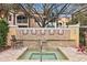 Relaxing spa with lion head accents and seating area at 4122 Central Sarasota Pkwy # 1914, Sarasota, FL 34238