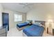 Bedroom with two twin beds and a ceiling fan at 4366 Madeira Ct # 3356, Sarasota, FL 34233