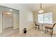 Casual dining area with table and chairs near entryway at 4366 Madeira Ct # 3356, Sarasota, FL 34233
