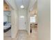 Bright condo entryway with view to bedroom and living area at 4366 Madeira Ct # 3356, Sarasota, FL 34233