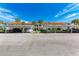 Condo building with covered parking and lush landscaping at 4366 Madeira Ct # 3356, Sarasota, FL 34233