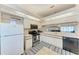 Well-equipped kitchen with stainless steel appliances at 4366 Madeira Ct # 3356, Sarasota, FL 34233