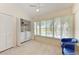Laundry room with washer, dryer, and extra storage at 4366 Madeira Ct # 3356, Sarasota, FL 34233