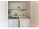 Well-lit laundry room with washer and dryer at 4366 Madeira Ct # 3356, Sarasota, FL 34233