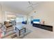 Spacious living room with vaulted ceilings and comfy seating at 4366 Madeira Ct # 3356, Sarasota, FL 34233