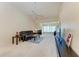 Living room with large TV, sofa, and open floor plan at 4366 Madeira Ct # 3356, Sarasota, FL 34233