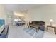 Open concept living and dining area with vaulted ceiling at 4366 Madeira Ct # 3356, Sarasota, FL 34233