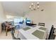Open living room with a view of the dining area at 4366 Madeira Ct # 3356, Sarasota, FL 34233